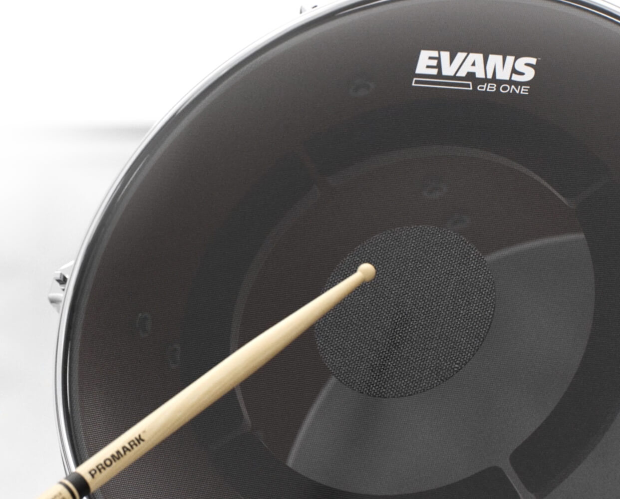 Closeup of dB One Tom Drumhead & Drumstick